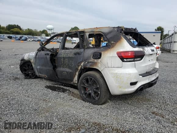 2014 Jeep Grand Cherokee SRT-8 с VIN 1C4RJFDJ0EC570886, выставлен на аукционе Copart как лот 83842595 с пробегом Не указан миль и Списание • Salvage title. История ставок и продаж доступна на DreamBid. Изображение 2.