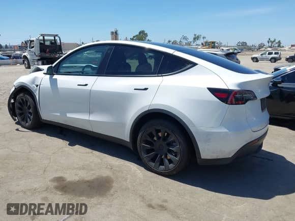 2022 Tesla Model Y Long Range z VIN 7SAYGDEE3NF413701, wystawiony jako IAAI lot #43045999 z przebiegiem 17 042 mil mil oraz . Historia ofert i sprzedaży dostępna na DreamBid. Obrazek 3.