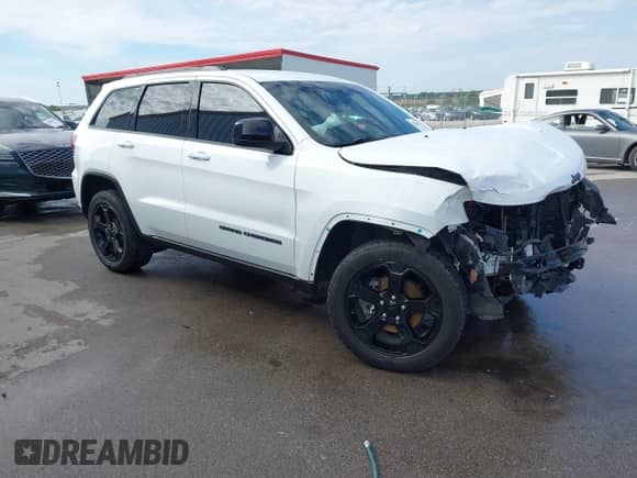 2018 Jeep Grand Cherokee Laredo E with VIN 1C4RJFAG1JC370361, listed as a IAAI auction lot 43284928 with 75,952 mi miles and . Bid and sale history available at DreamBid. Image 1.