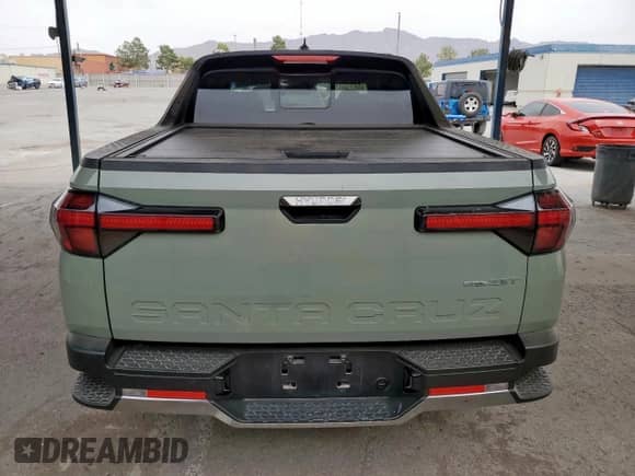 2024 Hyundai Santa Cruz Limited с VIN 5NTJEDDFXRH118053, выставлен на аукционе Copart как лот 59145235 с пробегом 5 578 миль миль и Списание • Salvage title. История ставок и продаж доступна на DreamBid. Изображение 6.