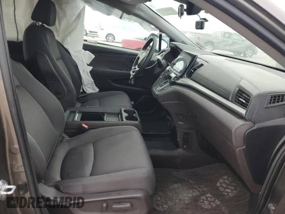 2023 Honda Odyssey EX с VIN 5FNRL6H50PB020861, выставлен на аукционе Copart как лот 57513205 с пробегом 229 947 миль миль и Списание • Salvage title. История ставок и продаж доступна на DreamBid. Изображение 7.