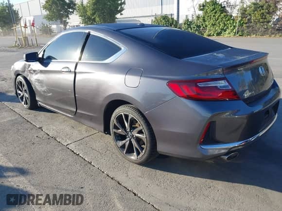 2017 Honda Accord Touring with VIN 1HGCT2B07HA004373, listed as a IAAI auction lot 43365975 with 140,599 mi miles and . Bid and sale history available at DreamBid. Image 3.