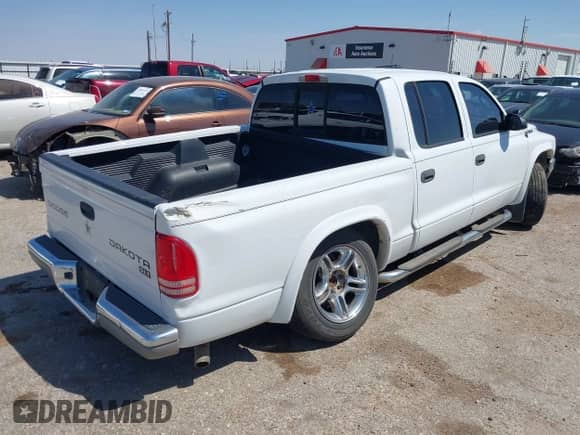 2004 Dodge Dakota SLT with VIN 1D7HL48K34S758499, listed as a IAAI auction lot 42035062 with 145,305 mi miles and . Bid and sale history available at DreamBid. Image 4.