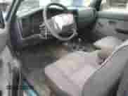 1997 Toyota Tacoma z VIN 4TAWM72NXVZ296658, wystawiony jako Copart lot #78831984 z przebiegiem 228 827 mil mil oraz Szkoda całkowita • Salvage title. Historia ofert i sprzedaży dostępna na DreamBid. Obrazek 8.