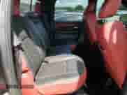 2016 Ram 1500 Rebel z VIN 1C6RR7YTXGS407222, wystawiony jako Copart lot #69983735 z przebiegiem 123 935 mil mil oraz Szkoda całkowita • Salvage title. Historia ofert i sprzedaży dostępna na DreamBid. Obrazek 11.