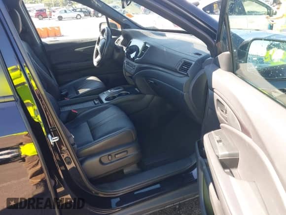 2023 Honda Passport TrailSport с VIN 5FNYF8H64PB033801, выставлен на аукционе IAAI как лот 43140933 с пробегом 38 095 миль миль и . История ставок и продаж доступна на DreamBid. Изображение 5.