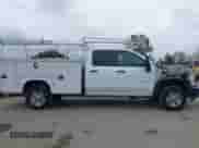 2020 Chevrolet Silverado 2500HD Work Truck z VIN 1GB2WLE78LF284403, wystawiony jako IAAI lot #42076524 z przebiegiem 21 478 mil mil oraz . Historia ofert i sprzedaży dostępna na DreamBid. Obrazek 13.