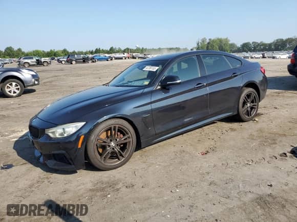 2015 BMW 4 Series 428i xDrive z VIN WBA4C9C59FD330304, wystawiony jako Copart lot #64786165 z przebiegiem 156 889 mil mil oraz Szkoda całkowita • Salvage title. Historia ofert i sprzedaży dostępna na DreamBid. Obrazek 1.