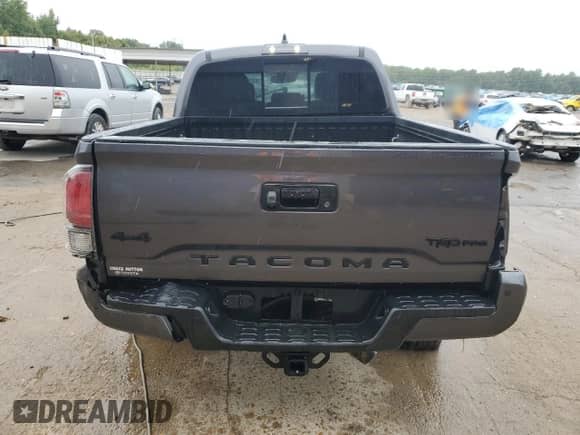 2022 Toyota Tacoma SR с VIN 3TYCZ5AN4NT102730, выставлен на аукционе Copart как лот 70374165 с пробегом 39 034 миль миль и Списание • Salvage title. История ставок и продаж доступна на DreamBid. Изображение 6.