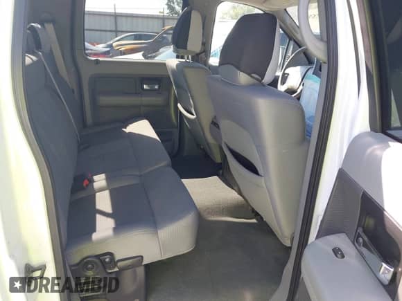 2007 Ford F-150 XLT z VIN 1FTRW12W47KB41987, wystawiony jako IAAI lot #43315296 z przebiegiem 89 783 mil mil oraz . Historia ofert i sprzedaży dostępna na DreamBid. Obrazek 8.