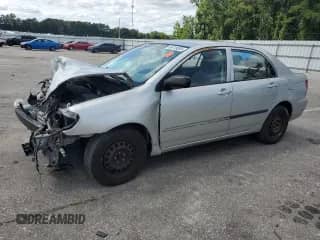 2003 Toyota Corolla LE with VIN 1NXBR32E23Z175920, listed as a Copart auction lot 68749555 with 212,914 mi miles and Salvage title. Bid and sale history available at DreamBid. Image 1.