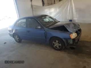 2000 Hyundai Accent with VIN KMHCG45G6YU066218, listed as a Copart auction lot 84948715 with 110,059 mi miles and Salvage title. Bid and sale history available at DreamBid. Image 4.