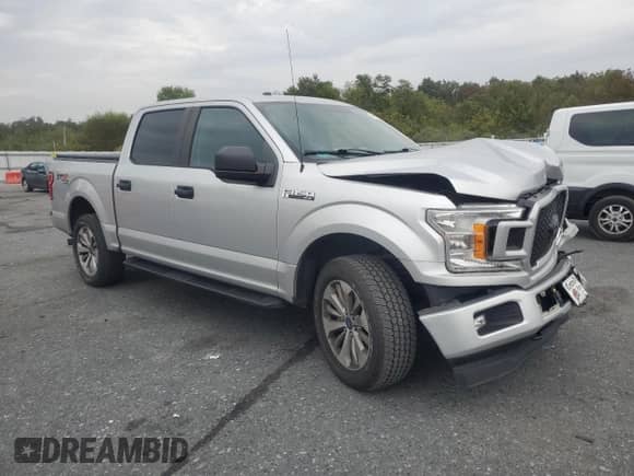 2018 Ford F-150 XLT с VIN 1FTEW1EP0JFA54462, выставлен на аукционе Copart как лот 84023205 с пробегом 70 194 миль миль и Списание • Salvage title. История ставок и продаж доступна на DreamBid. Изображение 4.