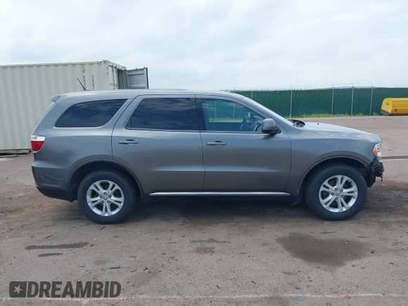 2012 Dodge Durango SXT with VIN 1C4RDJAG9CC181275, listed as a IAAI auction lot 42760696 with 211,805 mi miles and . Bid and sale history available at DreamBid. Image 14.