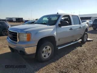 2008 GMC Sierra 1500 SL with VIN 2GTEK13C181291264, listed as a Copart auction lot 63838965 with 121,611 mi miles and Salvage title. Bid and sale history available at DreamBid. Image 1.