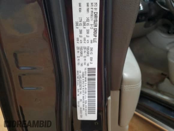 2013 Dodge Durango Crew with VIN 1C4RDJDG9DC682700, listed as a Copart auction lot 68078015 with 169,828 mi miles and Salvage title. Bid and sale history available at DreamBid. Image 13.