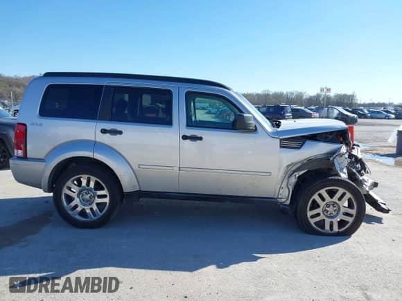 2010 Dodge Nitro Heat with VIN 1D4PU4GK4AW157565, listed as a IAAI auction lot 41851400 with 209,535 mi miles and . Bid and sale history available at DreamBid. Image 13.