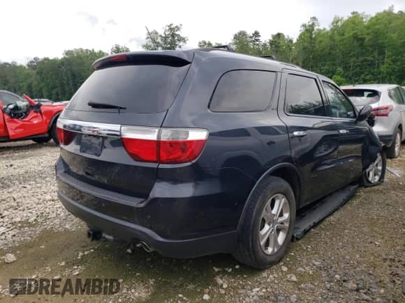 2013 Dodge Durango Crew with VIN 1C4RDHDG5DC692682, listed as a Copart auction lot 51026374 with 249,010 mi miles and Salvage title. Bid and sale history available at DreamBid. Image 3.