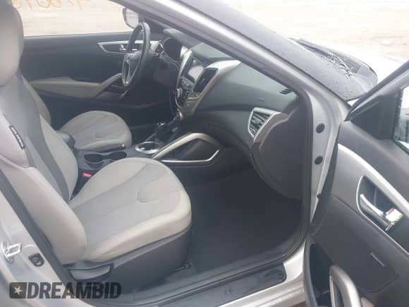 2012 Hyundai Veloster w/Black Int с VIN KMHTC6AD1CU034787, выставлен на аукционе IAAI как лот 42607847 с пробегом 126 912 миль миль и . История ставок и продаж доступна на DreamBid. Изображение 5.