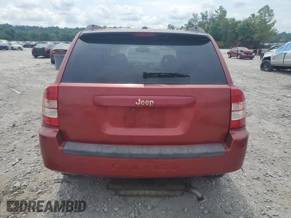 2007 Jeep Compass Sport with VIN 1J8FT47W57D112226, listed as a Copart auction lot 66689875 with 124,276 mi miles and Salvage title. Bid and sale history available at DreamBid. Image 6.