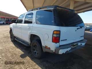2005 Chevrolet Tahoe LS z VIN 1GNEK13T25R156837, wystawiony jako IAAI lot #43254559 z przebiegiem 200 636 mil mil oraz . Historia ofert i sprzedaży dostępna na DreamBid. Obrazek 3.