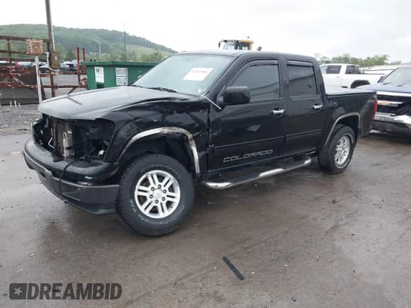 2012 Chevrolet Colorado 1LT с VIN 1GCHTCFEXC8165154, выставлен на аукционе IAAI как лот 42301986 с пробегом 166 527 миль миль и . История ставок и продаж доступна на DreamBid. Изображение 18.