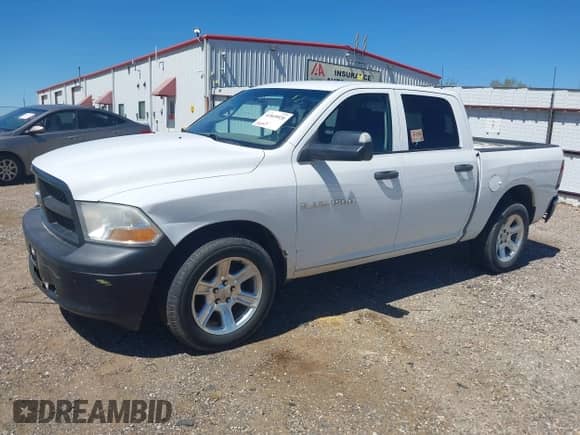 2012 Ram 1500 Tradesman с VIN 1C6RD7KP3CS235250, выставлен на аукционе IAAI как лот 41849020 с пробегом 138 068 миль миль и . История ставок и продаж доступна на DreamBid. Изображение 2.