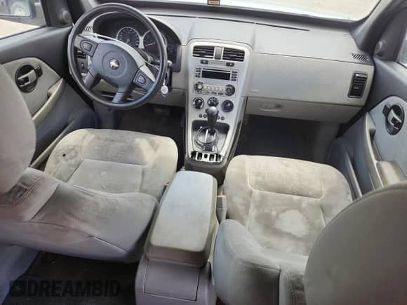 2005 Chevrolet Equinox LS z VIN 2CNDL13F056200952, wystawiony jako Copart lot #70184355 z przebiegiem 176 565 mil mil oraz Szkoda całkowita • Salvage title. Historia ofert i sprzedaży dostępna na DreamBid. Obrazek 8.