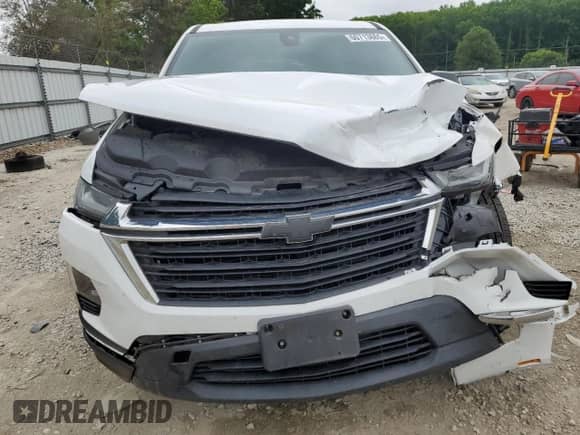 2023 Chevrolet Traverse LS with VIN 1GNEVFKW5PJ143078, listed as a Copart auction lot 60713665 with 56,117 mi miles and Salvage title. Bid and sale history available at DreamBid. Image 5.