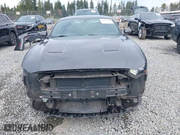 2018 Ford Mustang EcoBoost with VIN 1FA6P8TH0J5176935, listed as a IAAI auction lot 43464740 with 94,367 mi miles and . Bid and sale history available at DreamBid. Image 6.