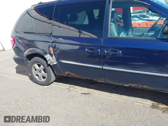 2004 Dodge Caravan SXT with VIN 2D4GP44L84R562829, listed as a IAAI auction lot 41870887 with 154,397 mi miles and . Bid and sale history available at DreamBid. Image 6.