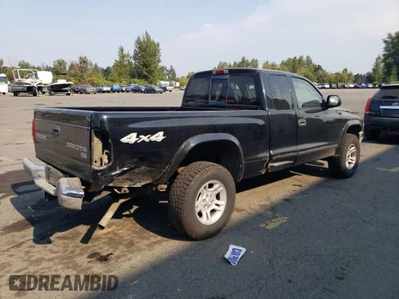 2004 Dodge Dakota SLT с VIN 1D7HG42N14S565713, выставлен на аукционе Copart как лот 70764455 с пробегом 118 859 миль миль и Списание • Salvage title. История ставок и продаж доступна на DreamBid. Изображение 3.