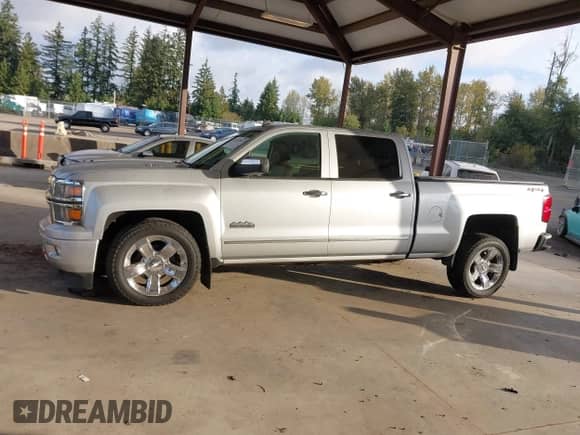 2014 Chevrolet Silverado 1500 High Country z VIN 3GCUKTEJXEG271648, wystawiony jako IAAI lot #43452051 z przebiegiem 119 705 mil mil oraz . Historia ofert i sprzedaży dostępna na DreamBid. Obrazek 14.