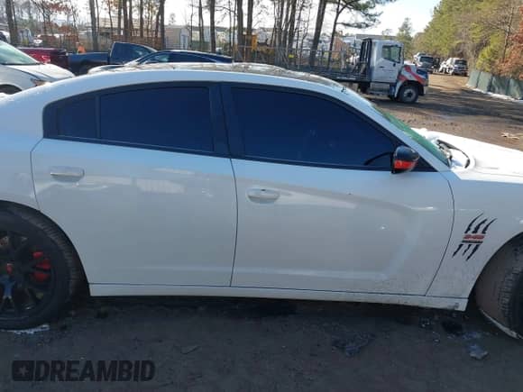 2013 Dodge Charger RT с VIN 2C3CDXCT7DH583673, выставлен на аукционе IAAI как лот 41370924 с пробегом 133 474 миль миль и . История ставок и продаж доступна на DreamBid. Изображение 13.