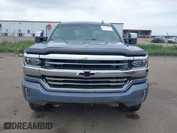2016 Chevrolet Silverado 1500 High Country z VIN 3GCUKTEC2GG235957, wystawiony jako IAAI lot #42532113 z przebiegiem 116 193 mil mil oraz . Historia ofert i sprzedaży dostępna na DreamBid. Obrazek 12.