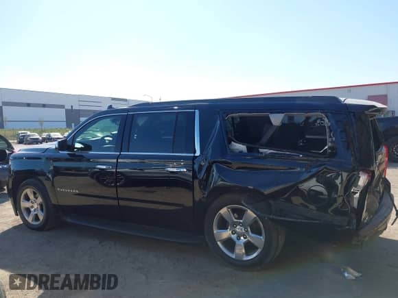 2019 Chevrolet Suburban LT z VIN 1GNSCHKC6KR364869, wystawiony jako IAAI lot #43414630 z przebiegiem 224 035 mil mil oraz . Historia ofert i sprzedaży dostępna na DreamBid. Obrazek 14.