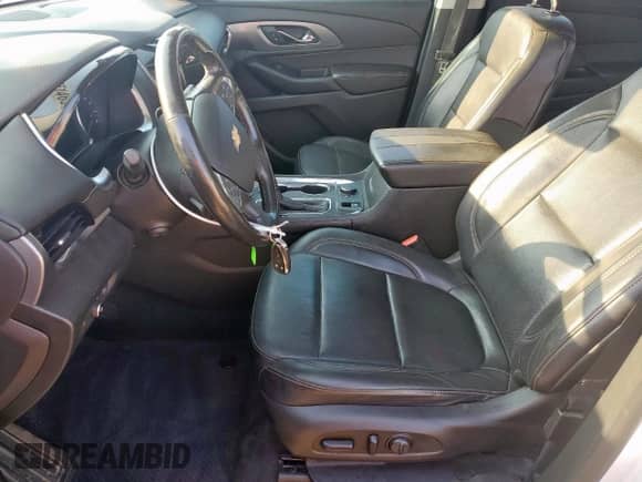 2018 Chevrolet Traverse Premier с VIN 1GNERKKW5JJ271213, выставлен на аукционе Copart как лот 81551465 с пробегом 143 278 миль миль и Списание • Salvage title. История ставок и продаж доступна на DreamBid. Изображение 7.