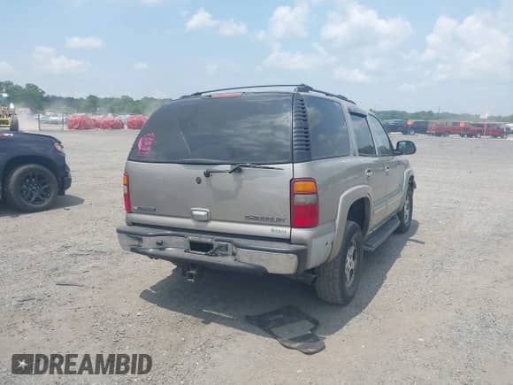 2002 Chevrolet Tahoe Z71 z VIN 1GNEK13Z32R322993, wystawiony jako IAAI lot #42456551 z przebiegiem 251 640 mil mil oraz . Historia ofert i sprzedaży dostępna na DreamBid. Obrazek 4.