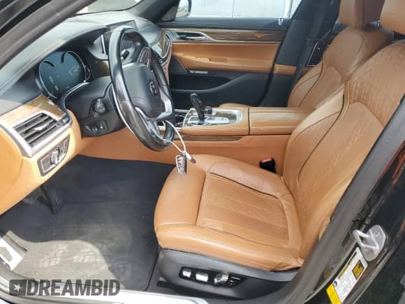 2016 BMW 7 Series 750i with VIN WBA7F0C53GGM20760, listed as a Copart auction lot 57230334 with 77,588 mi miles and Salvage title. Bid and sale history available at DreamBid. Image 7.