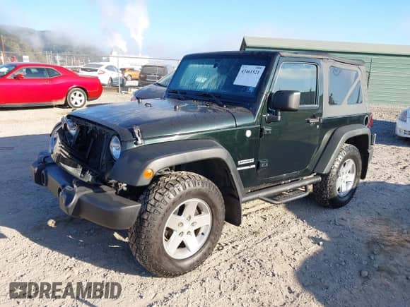 2012 Jeep Wrangler Sport with VIN 1C4AJWAG1CL168717, listed as a IAAI auction lot 43461521 with 106,272 mi miles and . Bid and sale history available at DreamBid. Image 2.