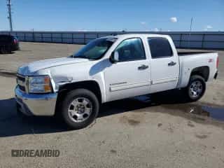 2012 Chevrolet Silverado 1500 LT with VIN 3GCPKSE78CG256607, listed as a Copart auction lot 82446975 with 183,529 mi miles and Salvage title. Bid and sale history available at DreamBid. Image 1.