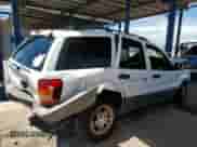 2003 Jeep Grand Cherokee Laredo z VIN 1J4GX48S53C518626, wystawiony jako Copart lot #71123695 z przebiegiem 196 154 mil mil oraz Szkoda całkowita • Salvage title. Historia ofert i sprzedaży dostępna na DreamBid. Obrazek 3.