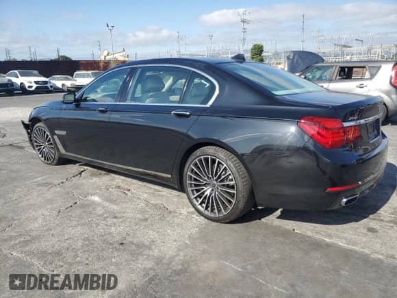 2013 BMW 7 Series 740Li xDrive с VIN WBAYF4C55DD127791, выставлен на аукционе Copart как лот 66229385 с пробегом 46 859 миль миль и Списание • Salvage title. История ставок и продаж доступна на DreamBid. Изображение 2.
