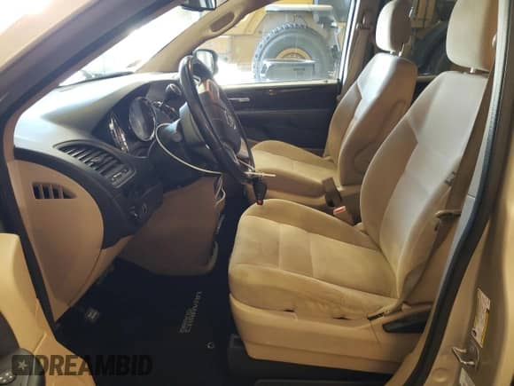 2014 Dodge Grand Caravan American Value z VIN 2C4RDGBG4ER389169, wystawiony jako Copart lot #81723195 z przebiegiem 196 883 mil mil oraz Szkoda całkowita • Salvage title. Historia ofert i sprzedaży dostępna na DreamBid. Obrazek 7.