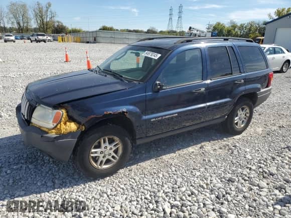2004 Jeep Grand Cherokee Laredo with VIN 1J4GX48S14C220124, listed as a Copart auction lot 84979245 with 237,797 mi miles and Salvage title. Bid and sale history available at DreamBid. Image 1.