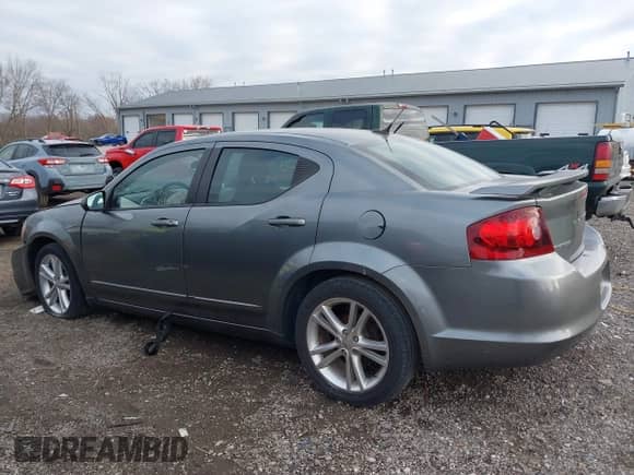 2011 Dodge Avenger Heat with VIN 1B3BD1FGXBN584583, listed as a IAAI auction lot 41042293 with 162,976 mi miles and . Bid and sale history available at DreamBid. Image 14.