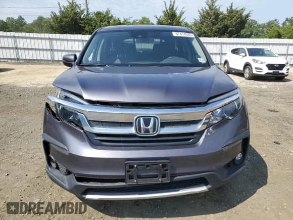 2022 Honda Pilot EX-L with VIN 5FNYF6H58NB020414, listed as a Copart auction lot 67414035 with 68,792 mi miles and Salvage title. Bid and sale history available at DreamBid. Image 5.