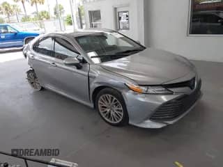 2020 Toyota Camry Hybrid XLE with VIN 4T1F31AK1LU533605, listed as a IAAI auction lot 42790450 with 98,102 mi miles and . Bid and sale history available at DreamBid. Image 1.