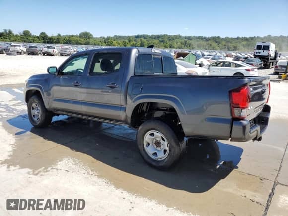 2021 Toyota Tacoma TRD Off Road with VIN 3TMCZ5AN9MM392750, listed as a Copart auction lot 70289245 with 76,487 mi miles and Salvage title. Bid and sale history available at DreamBid. Image 2.