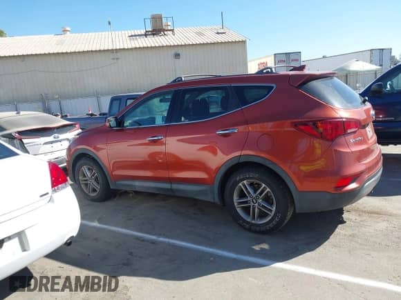 2017 Hyundai Santa Fe 2.4L z VIN 5XYZTDLB1HG443833, wystawiony jako IAAI lot #42908168 z przebiegiem 137 312 mil mil oraz . Historia ofert i sprzedaży dostępna na DreamBid. Obrazek 14.